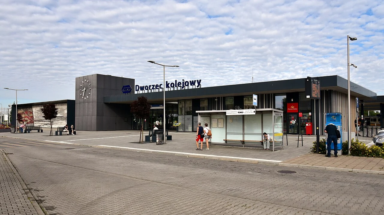 Oświęcim railway station entrance beside the bus shelters